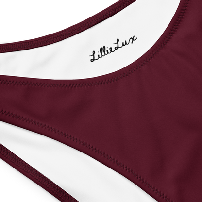 Detail of merlot bikini fabric and Lillie Lux logo close-up