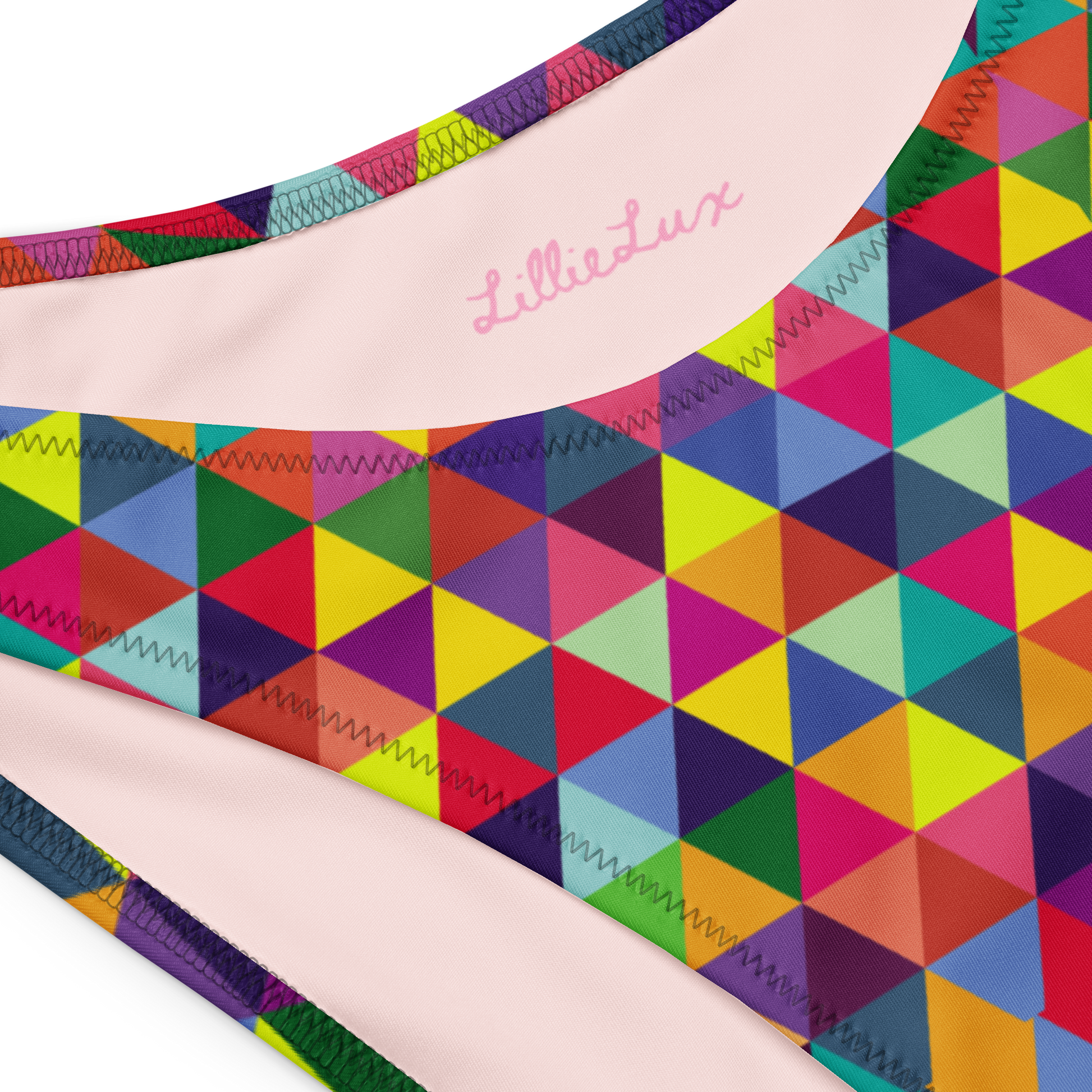 Lillie Lux logo on colorful geometric bikini fabric – Geo Pop pattern