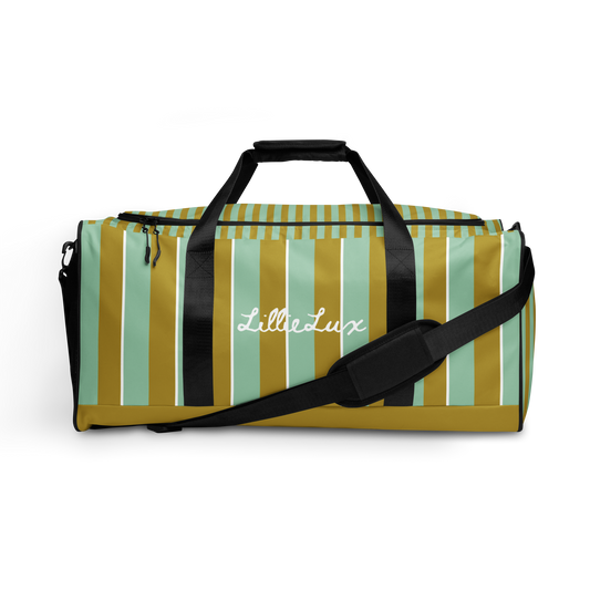 Front view of Palm Tonic Duffle Bag in muted aqua and olive green stripes with structured design and sleek dual handles LillieLux.com