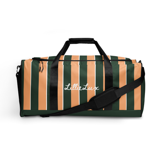 Front view of Sunset Stadium Duffle Bag with bold orange and deep green stripes, structured silhouette, and dual black handles LillieLux.com